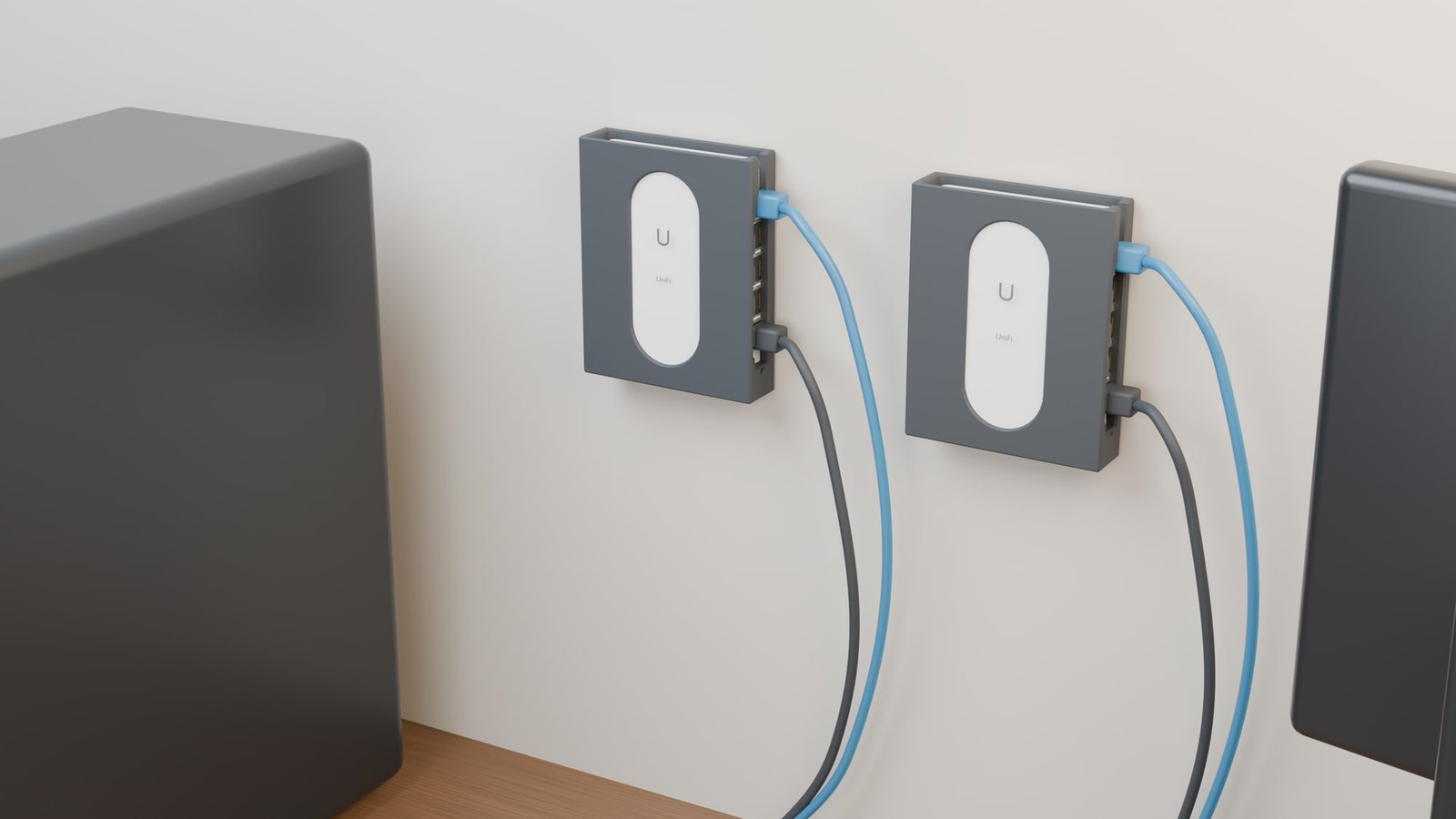 Blender visualization of the custom UniFi switch mount on a wall behind a desktop PC, with the mounted switch visible